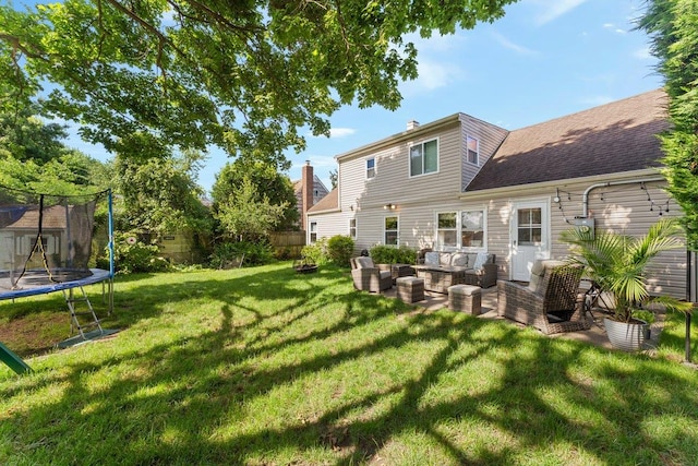 2691 Evans Rd, Oceanside, NY 11572 - fenced yard featuring a trampoline and an outdoor hangout area