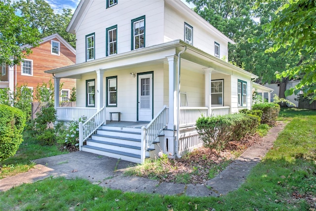 2 Shore Rd, East Setauket, NY 11733 - view of front of house with a porch