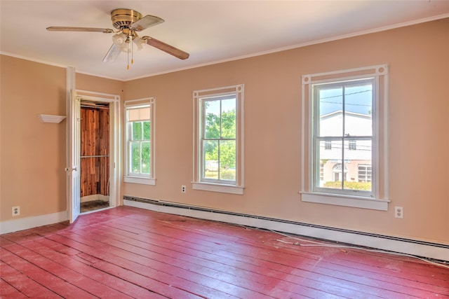 2 Shore Rd, East Setauket, NY 11733 - spare room featuring a baseboard radiator, ornamental molding, a ceiling fan, and hardwood / wood-style flooring