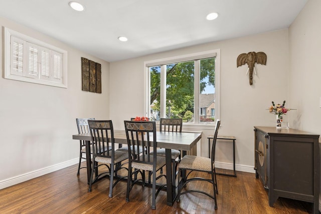 8 Walnut Rd, East Rockaway, NY 11518 - dining space featuring dark wood-style flooring and recessed lighting