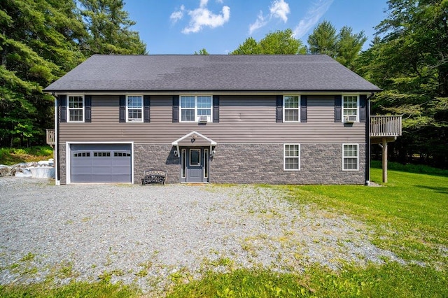 55 Townsend Rd, Liberty, NY 12754 - colonial home with an attached garage, a front lawn, stone siding, and driveway