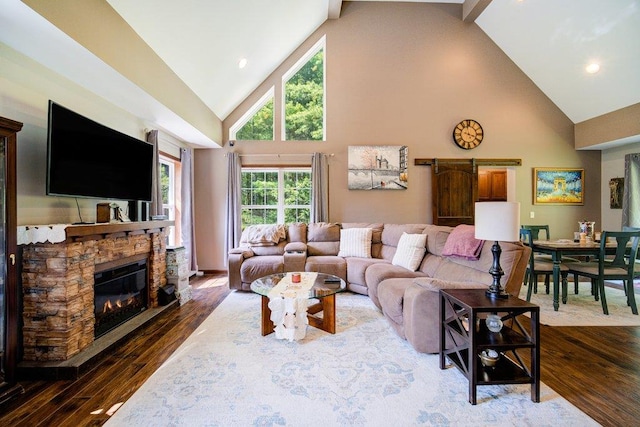 55 Townsend Rd, Liberty, NY 12754 - living room featuring high vaulted ceiling, hardwood / wood-style floors, a stone fireplace, and recessed lighting