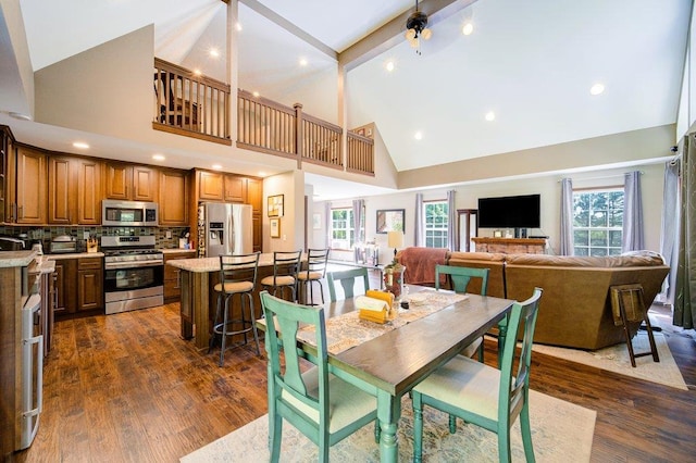 55 Townsend Rd, Liberty, NY 12754 - dining room with high vaulted ceiling, dark wood-style floors, and beamed ceiling
