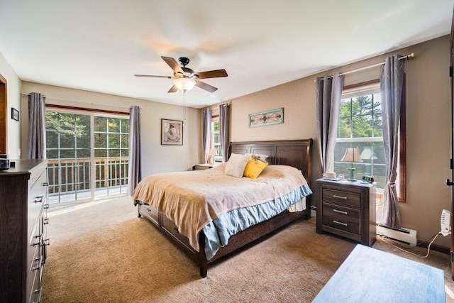 55 Townsend Rd, Liberty, NY 12754 - carpeted bedroom with multiple windows, baseboard heating, access to outside, and ceiling fan
