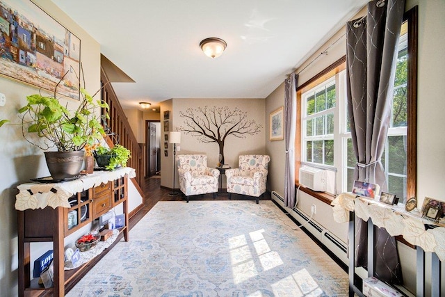55 Townsend Rd, Liberty, NY 12754 - hallway featuring stairs, cooling unit, a baseboard heating unit, and wood finished floors