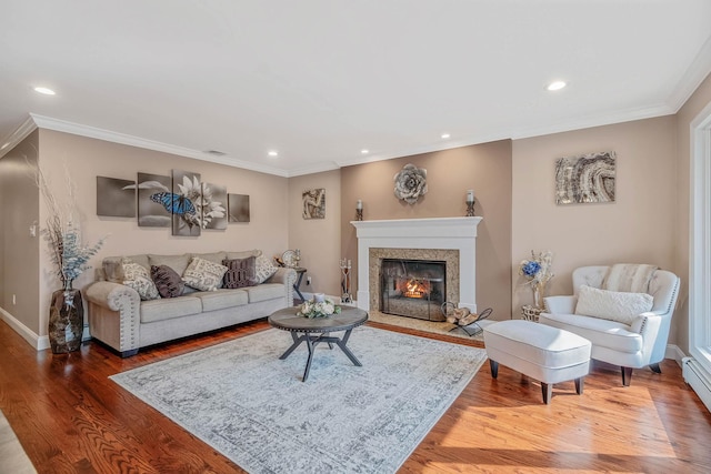 3 Stark Dr, Center Moriches, NY 11934 - living area featuring crown molding, wood finished floors, recessed lighting, and a premium fireplace