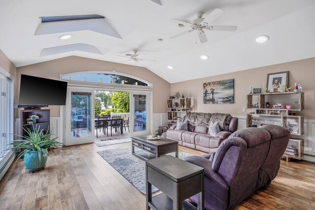 3 Stark Dr, Center Moriches, NY 11934 - living room with lofted ceiling, ceiling fan, wood finished floors, recessed lighting, and a skylight