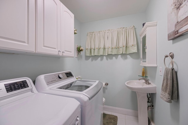 3 Stark Dr, Center Moriches, NY 11934 - washroom featuring independent washer and dryer, tile patterned flooring, and cabinet space