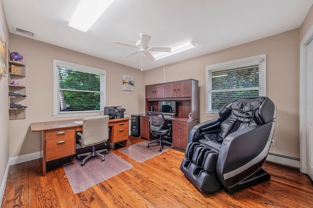 3 Stark Dr, Center Moriches, NY 11934 - office space with baseboard heating, plenty of natural light, light wood-style flooring, and ceiling fan