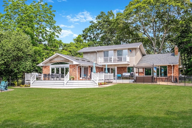 3 Stark Dr, Center Moriches, NY 11934 - rear view of property with brick siding, a chimney, a covered hot tub, and a deck