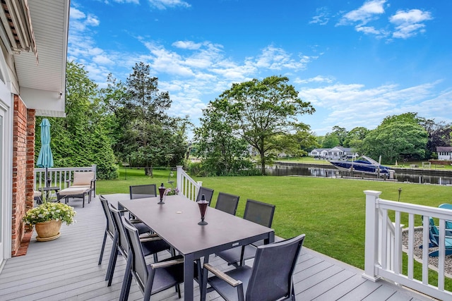3 Stark Dr, Center Moriches, NY 11934 - deck with a water view, outdoor dining area, and a fenced backyard