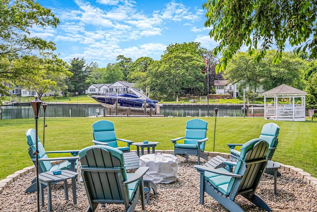 3 Stark Dr, Center Moriches, NY 11934 - view of green lawn with a water view, a gazebo, and a boat dock