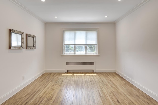 53 Nathan Hale Dr Unit 7A, Huntington, NY 11743 - empty room featuring radiator heating unit, ornamental molding, hardwood / wood-style floors, and recessed lighting