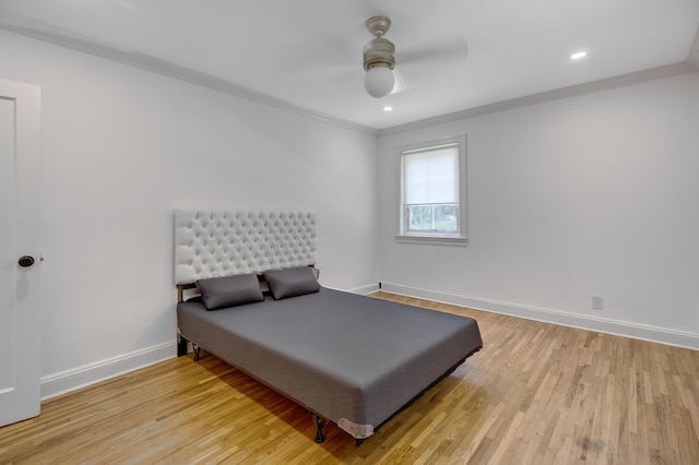 53 Nathan Hale Dr Unit 7A, Huntington, NY 11743 - bedroom with light wood-type flooring, crown molding, ceiling fan, and recessed lighting