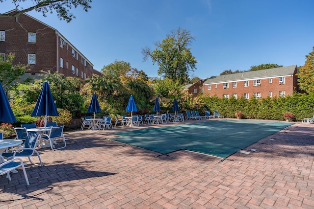 53 Nathan Hale Dr Unit 7A, Huntington, NY 11743 - view of swimming pool featuring a patio