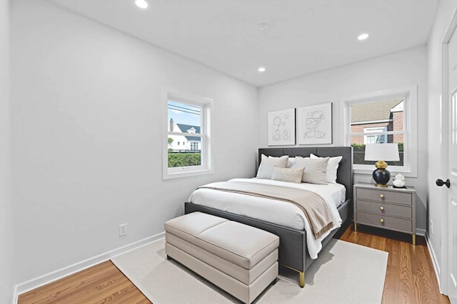 126 Lutz Dr, Valley Stream, NY 11580 - bedroom with wood finished floors and recessed lighting