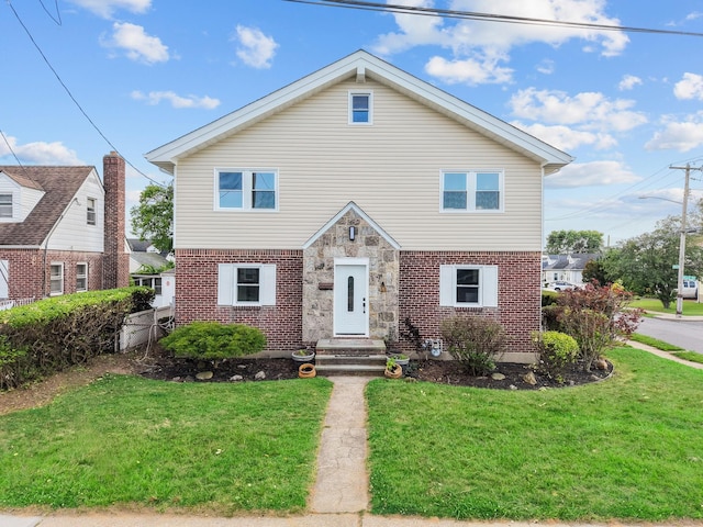 126 Lutz Dr, Valley Stream, NY 11580 - view of front of property with brick siding
