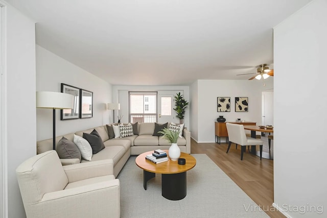 61-25 98th St Unit 11E, Rego Park, NY 11374 - living area featuring wood finished floors and ceiling fan