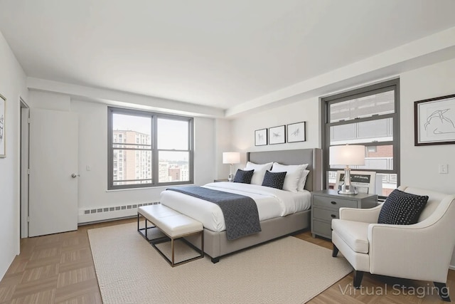 61-25 98th St Unit 11E, Rego Park, NY 11374 - bedroom with a baseboard heating unit and multiple windows