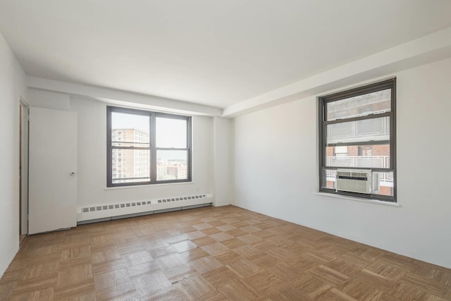 61-25 98th St Unit 11E, Rego Park, NY 11374 - spare room with baseboard heating and cooling unit