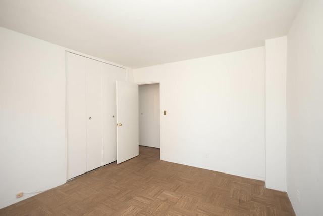 61-25 98th St Unit 11E, Rego Park, NY 11374 - unfurnished bedroom featuring a closet