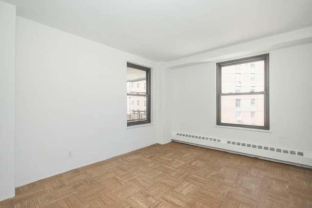 61-25 98th St Unit 11E, Rego Park, NY 11374 - spare room with a baseboard radiator