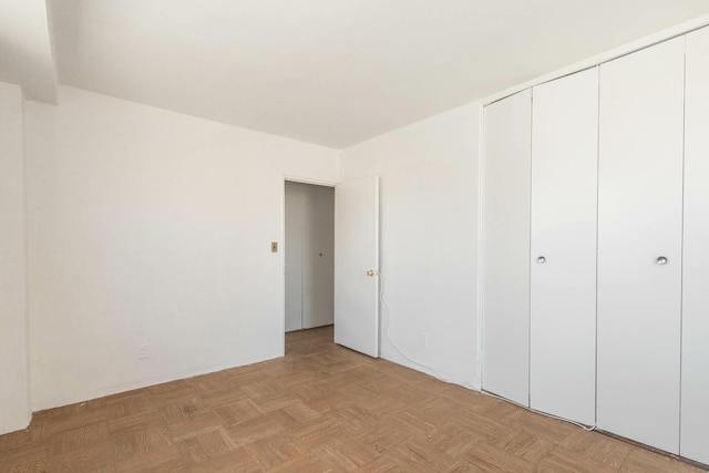 61-25 98th St Unit 11E, Rego Park, NY 11374 - unfurnished bedroom featuring a closet
