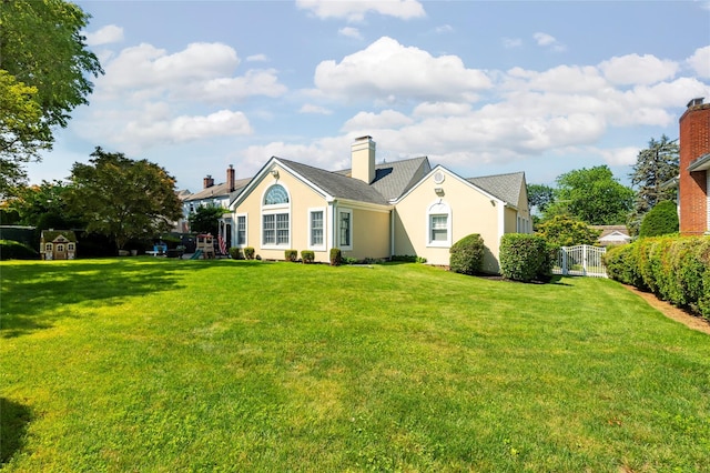 168 Dunwoodie St, Yonkers, NY 10704 - rear view of house featuring stucco siding