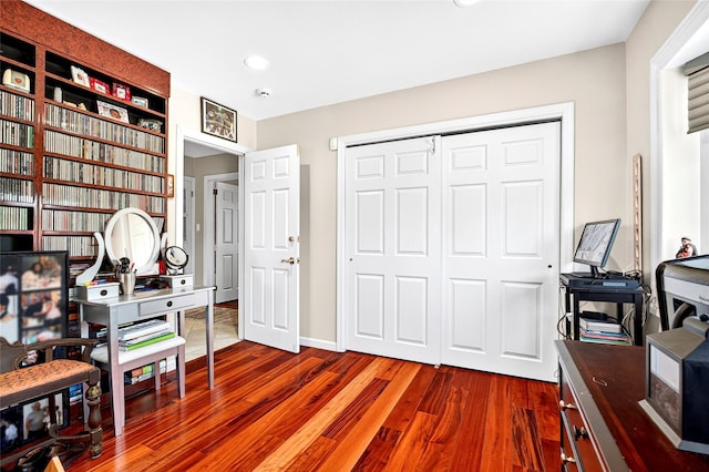 168 Dunwoodie St, Yonkers, NY 10704 - home office with dark wood-type flooring and recessed lighting