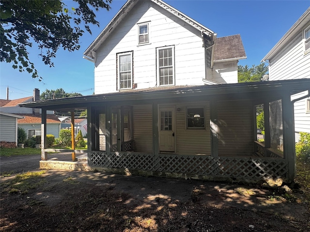 99 W Bridge St, Saugerties, NY 12477 - rear view of house featuring a porch