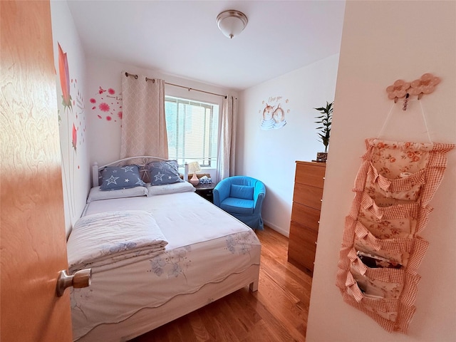 142-25 37th Ave Unit 2E, Flushing, NY 11354 - bedroom featuring wood finished floors