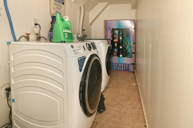 1244 Jefferson Ave, Brooklyn, NY 11221 - washroom featuring washer and clothes dryer and light tile patterned floors