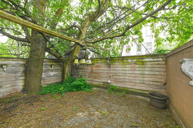 1244 Jefferson Ave, Brooklyn, NY 11221 - view of fenced backyard