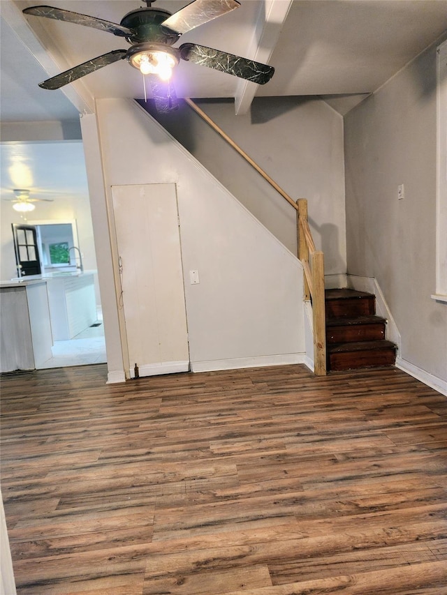 13SLake Drive, Patterson, NY 12563 - unfurnished living room featuring ceiling fan, wood finished floors, and stairway