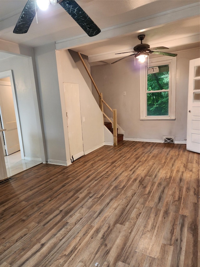 13SLake Drive, Patterson, NY 12563 - unfurnished living room featuring wood finished floors, ceiling fan, and stairs
