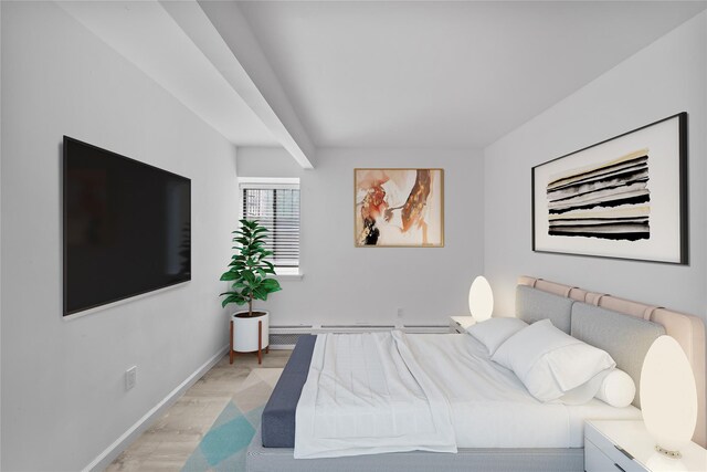 1440 Boston Post Unit 8K, Larchmont, NY 10543 - bedroom featuring light wood-style flooring and baseboard heating