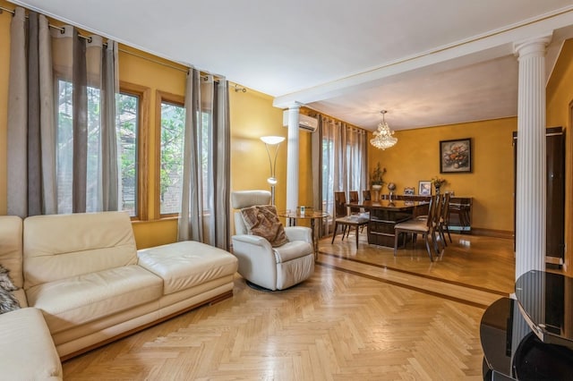 19615 Como Ave, Holliswood, NY 11423 - living room featuring ornate columns, plenty of natural light, a chandelier, and a wall mounted AC