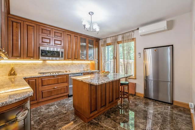 19615 Como Ave, Holliswood, NY 11423 - kitchen with appliances with stainless steel finishes, dark marble finish flooring, decorative backsplash, a wall unit AC, and brown cabinetry