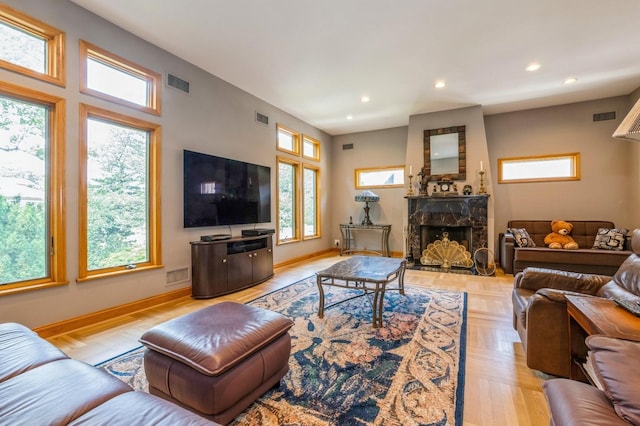 19615 Como Ave, Holliswood, NY 11423 - living room featuring recessed lighting and a premium fireplace