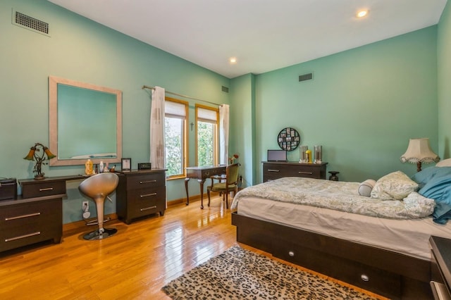 19615 Como Ave, Holliswood, NY 11423 - bedroom with wood finished floors, recessed lighting, and an office area