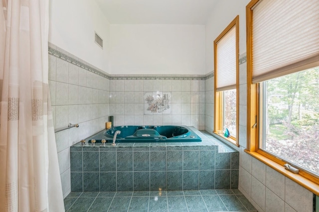 19615 Como Ave, Holliswood, NY 11423 - bathroom featuring a bath and tile patterned flooring