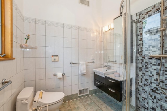 19615 Como Ave, Holliswood, NY 11423 - bathroom with a stall shower, tile walls, vanity, and a bidet