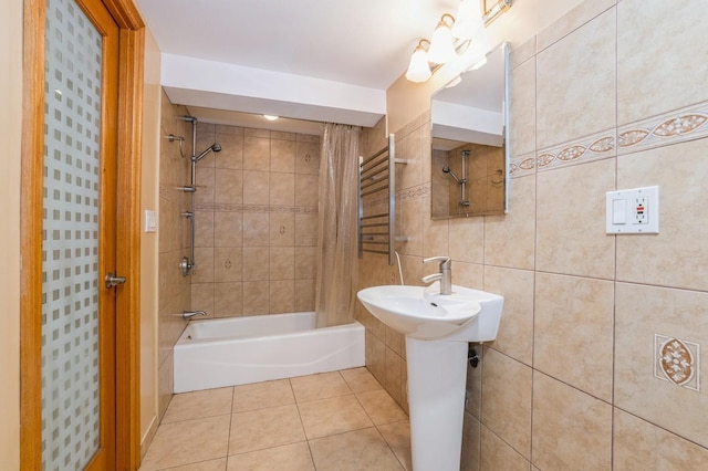 19615 Como Ave, Holliswood, NY 11423 - bathroom featuring  shower combination, tile walls, and tile patterned floors