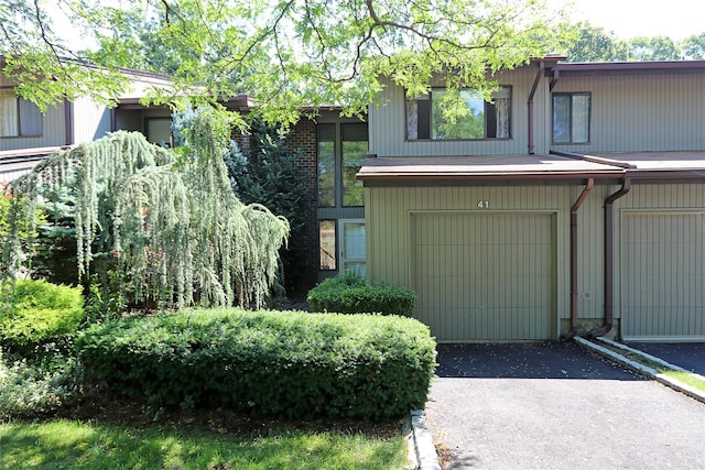 41 Carriage Ct, Jericho, NY 11753 - view of front of home featuring driveway