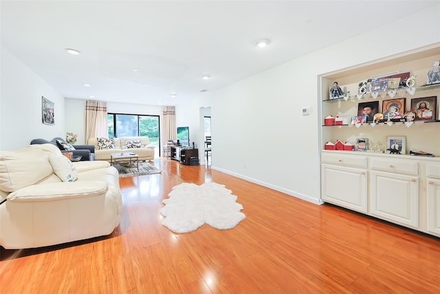 41 Carriage Ct, Jericho, NY 11753 - living room with light wood-type flooring and recessed lighting