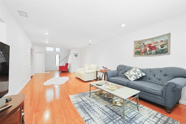 41 Carriage Ct, Jericho, NY 11753 - living area featuring stairway, wood finished floors, and recessed lighting