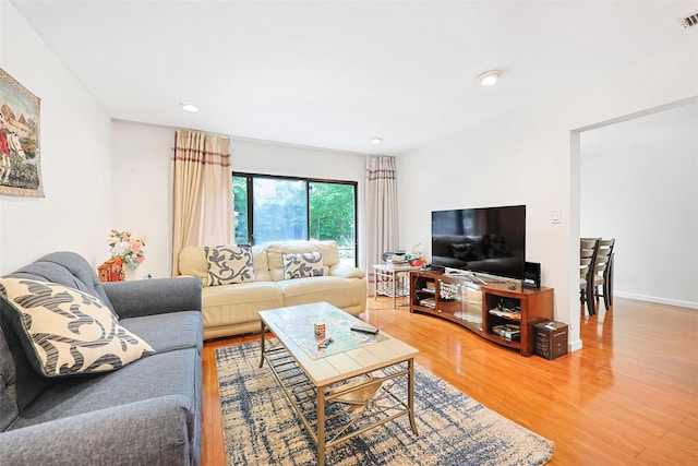 41 Carriage Ct, Jericho, NY 11753 - living room featuring light wood-type flooring and recessed lighting