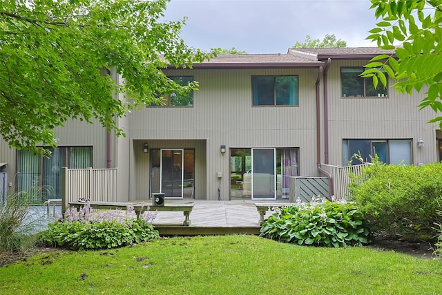 41 Carriage Ct, Jericho, NY 11753 - back of house with a lawn and a wooden deck