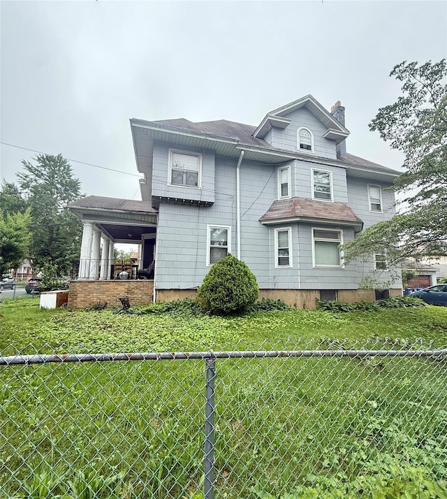 43-04 169th St, Flushing, NY 11358 - view of front of home featuring a chimney