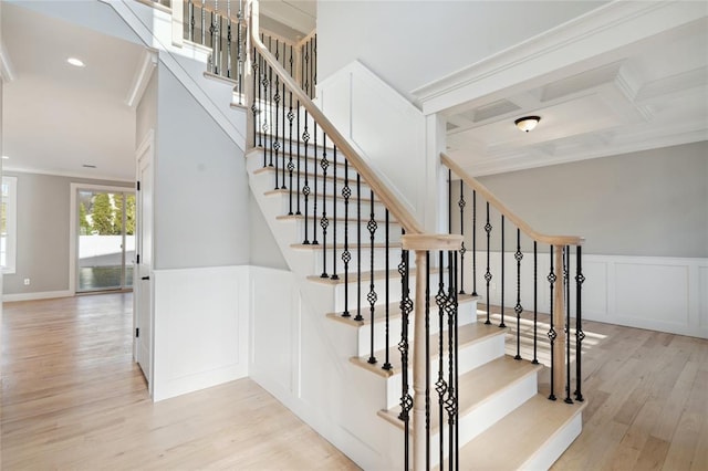 15 Cedar Dr, Old Bethpage, NY 11804 - stairs with wood finished floors, ornamental molding, a decorative wall, wainscoting, and recessed lighting